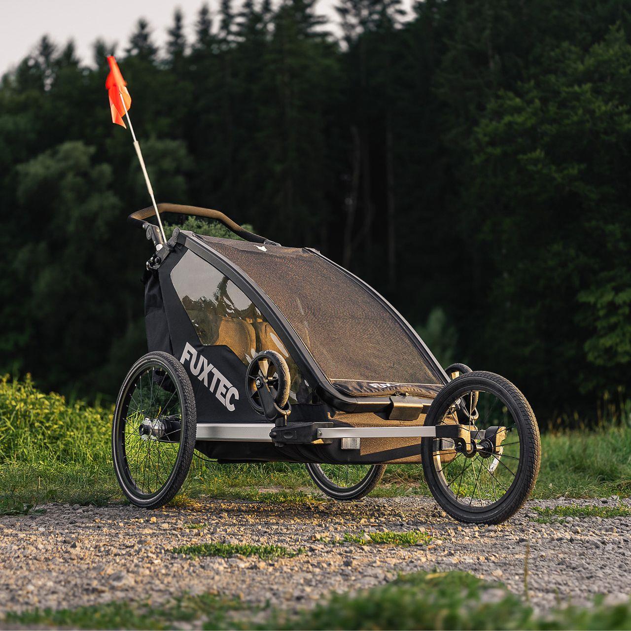 Remorque à vélo Sport Cruiser gris avec roue avant Jogger incluse